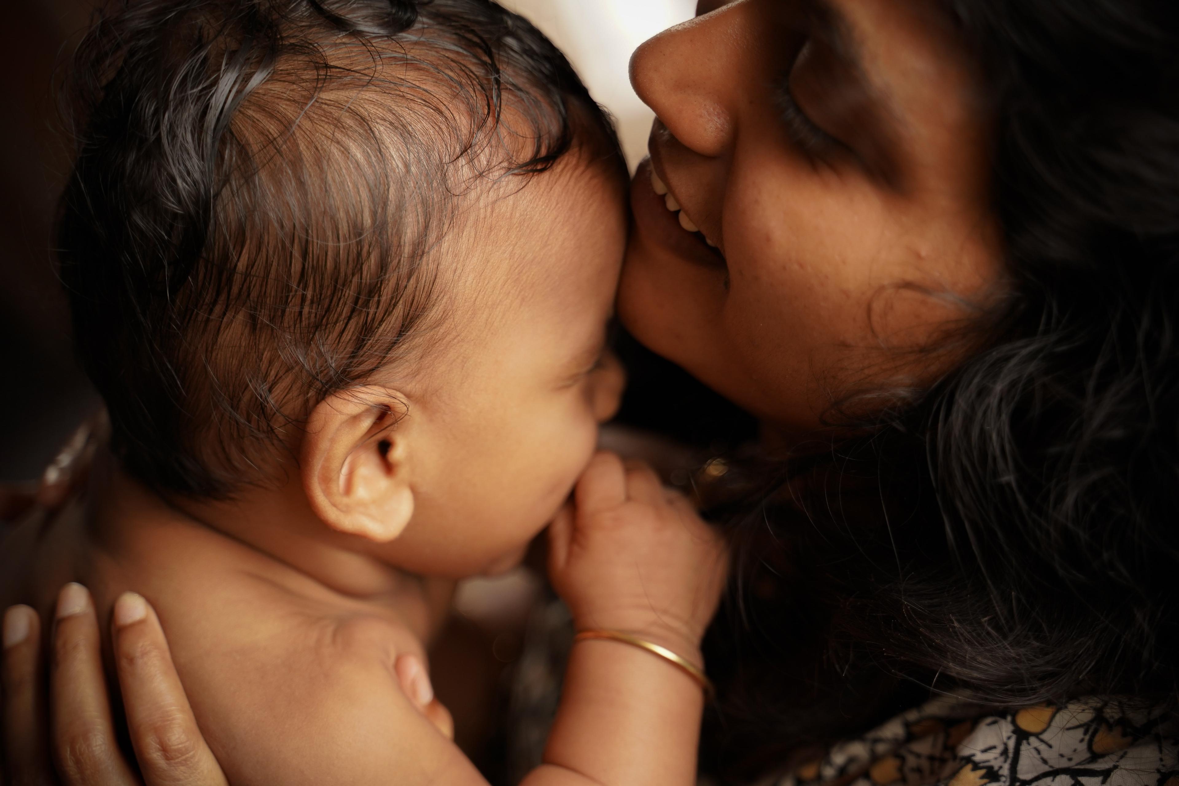 Image of a mother hugging her child