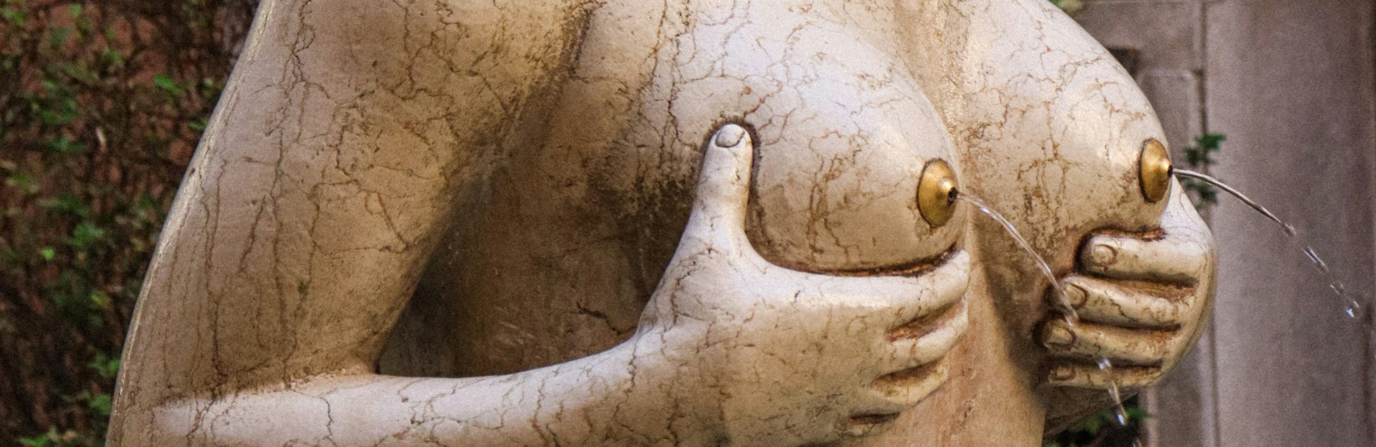 breast milk flows; statue with water from breasts